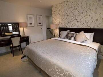 Фото номера Коттедж с 2 спальнями Курортные отели Kenmare Bay Hotel Lodges г. Кенмэр 5