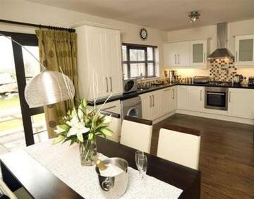 Фото номера Коттедж с 2 спальнями Курортные отели Kenmare Bay Hotel Lodges г. Кенмэр 3