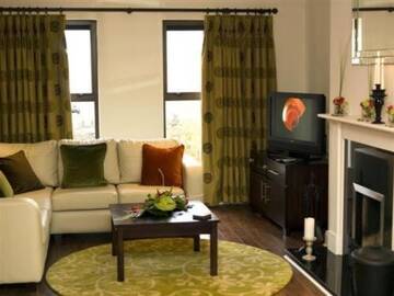 Фото номера Коттедж с 2 спальнями Курортные отели Kenmare Bay Hotel Lodges г. Кенмэр 9