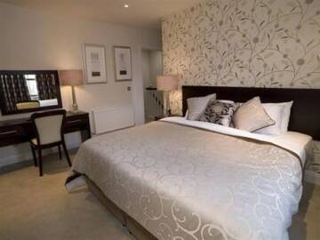 Фото номера Коттедж с 2 спальнями Курортные отели Kenmare Bay Hotel Lodges г. Кенмэр 13