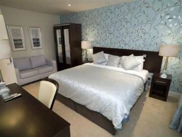 Фото номера Коттедж с 2 спальнями Курортные отели Kenmare Bay Hotel Lodges г. Кенмэр 11