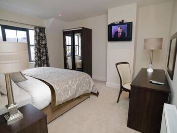 Фото номера Коттедж с 2 спальнями Курортные отели Kenmare Bay Hotel Lodges г. Кенмэр 8
