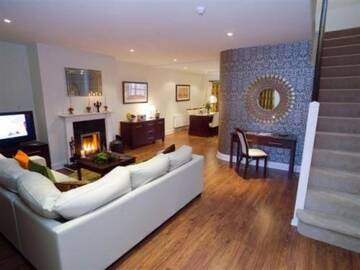 Фото номера Коттедж с 2 спальнями Курортные отели Kenmare Bay Hotel Lodges г. Кенмэр 14